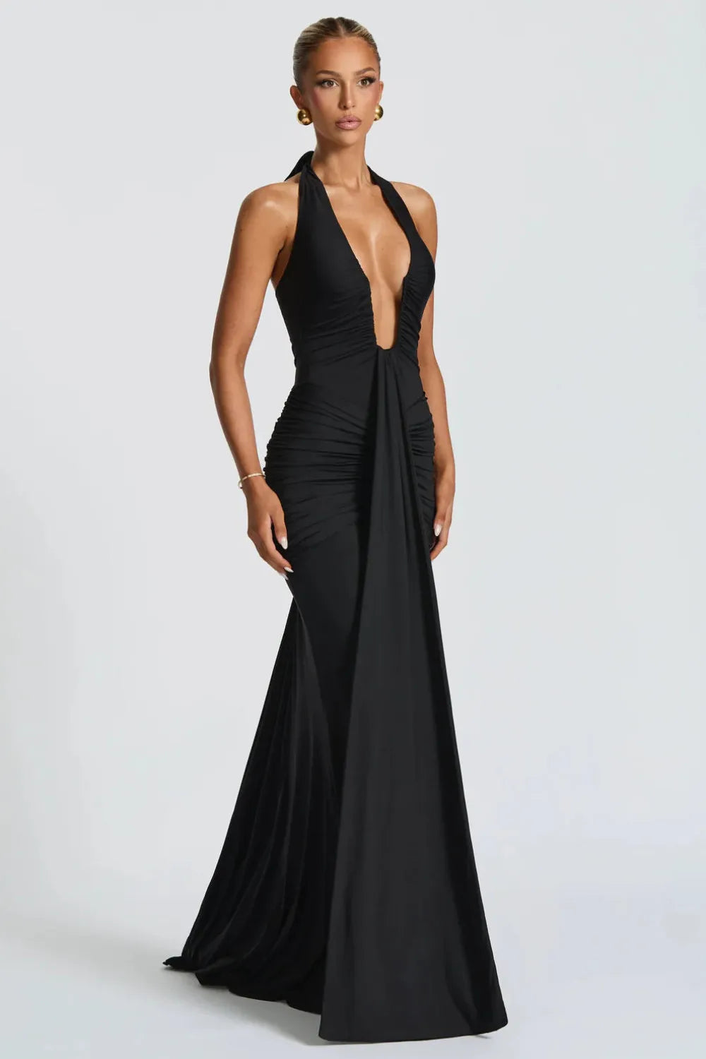 Black halter plunge v-neck ruched maxi dress with flowing train