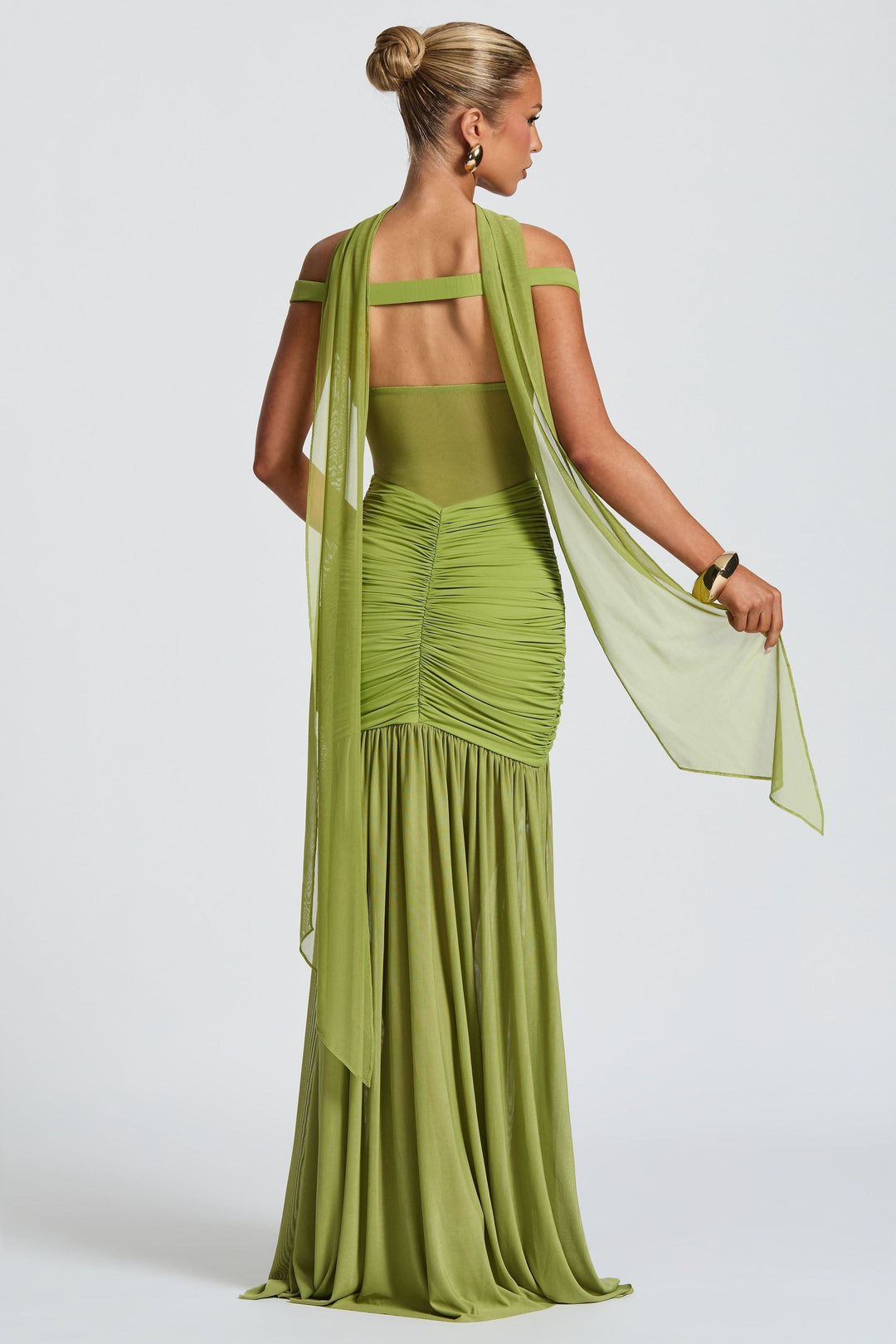 Back view of lime off-shoulder ruched maxi dress