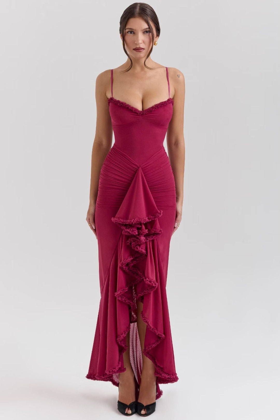 Burgundy ruffled spaghetti strap maxi dress with sweetheart neckline and asymmetrical hem