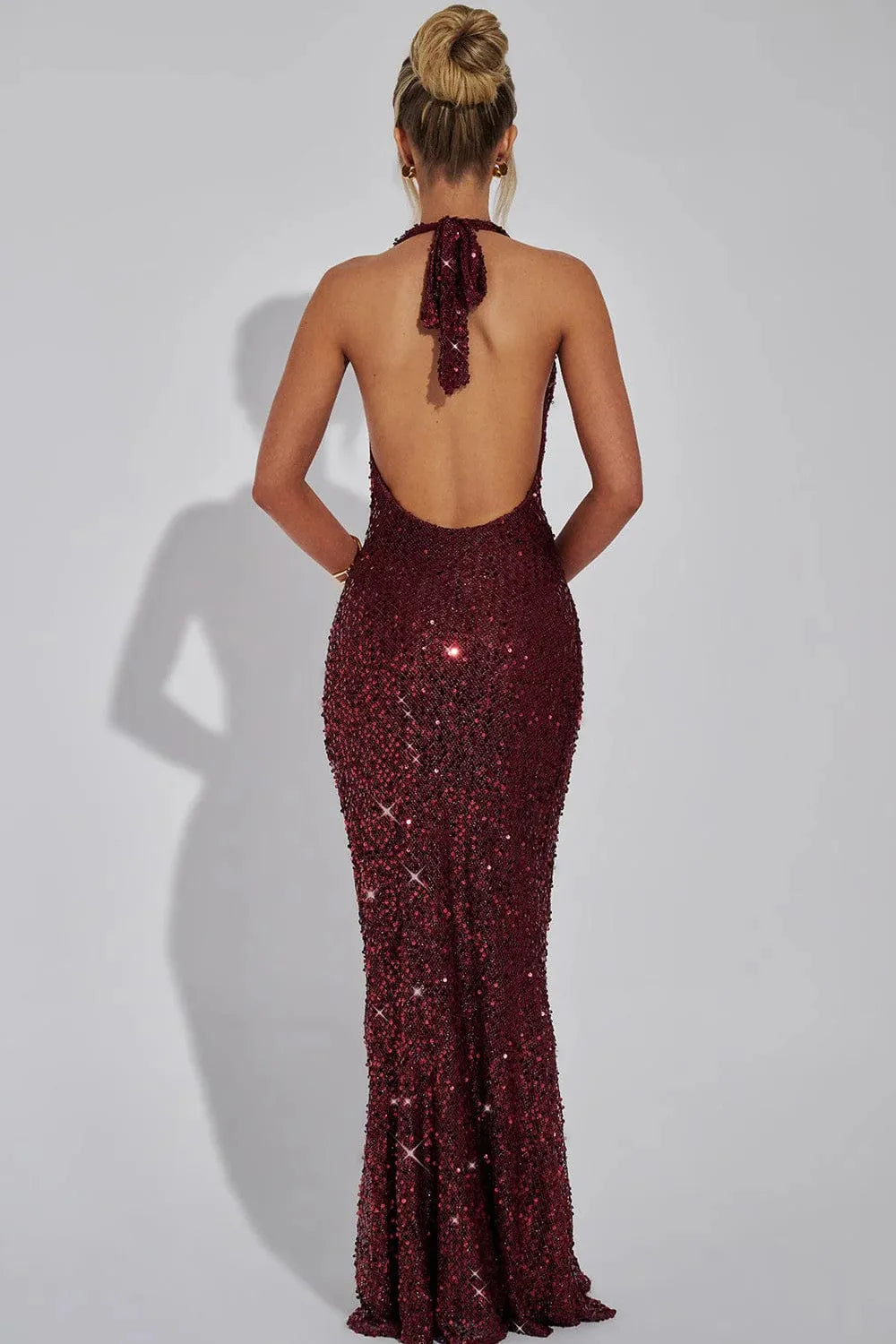 Burgundy sequin halter maxi dress back view with tie-back closure