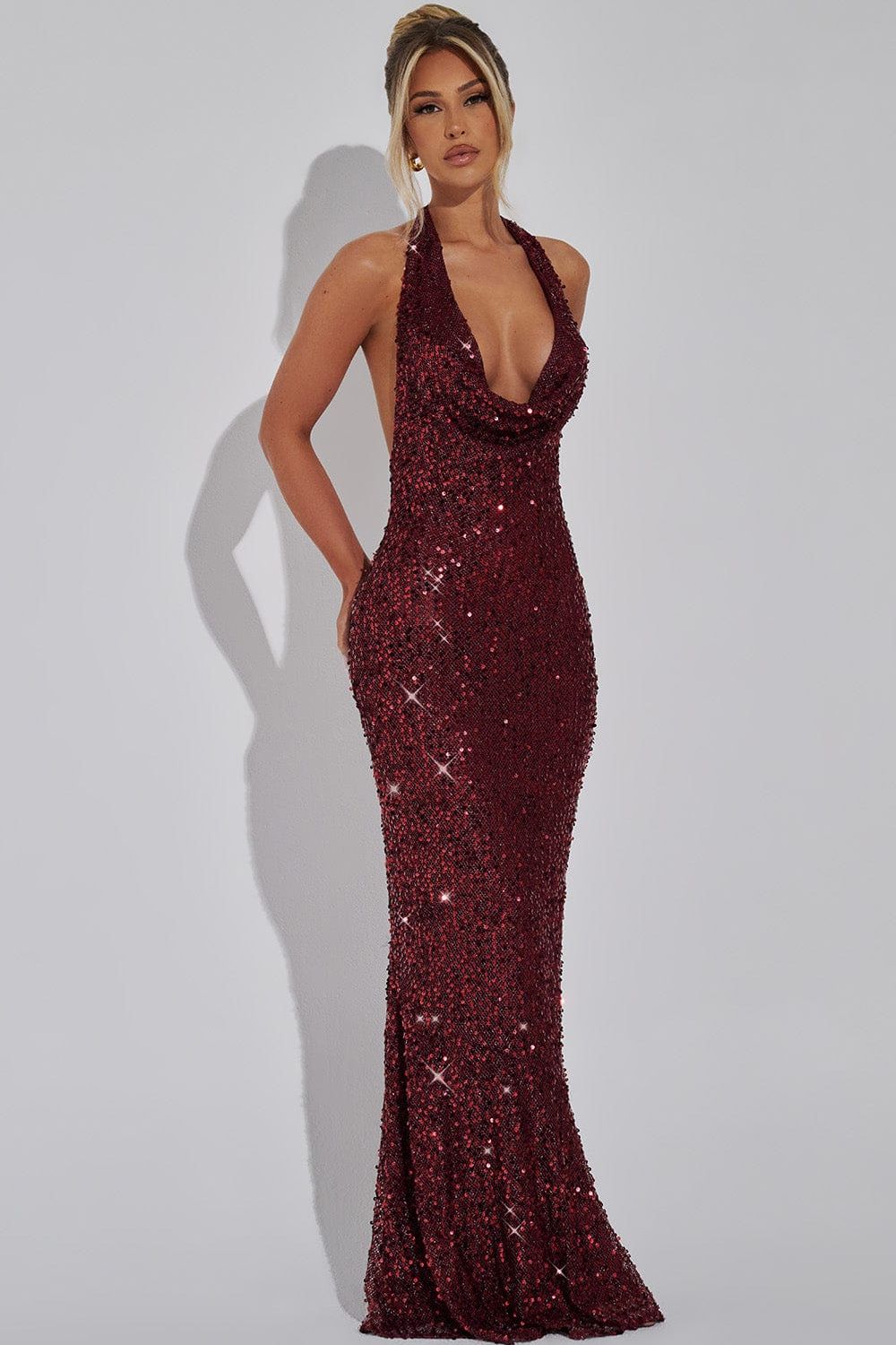 Burgundy sequin halter maxi dress front view with deep V-neckline