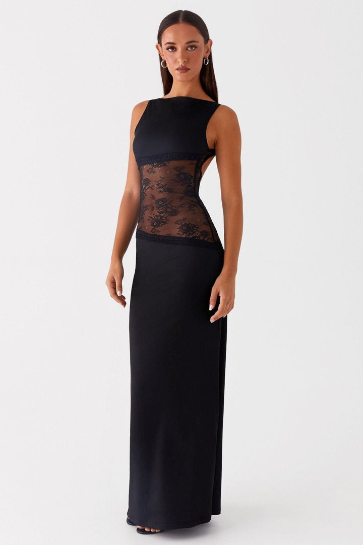 Black sleeveless maxi dress with sheer lace waist panel and solid bodice