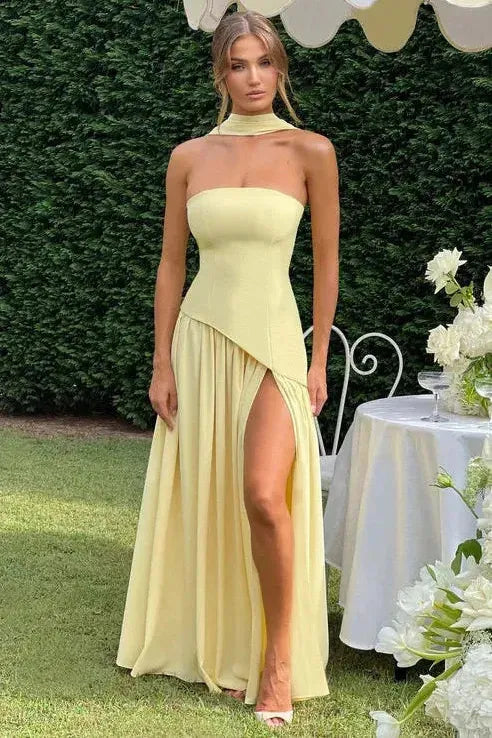 Pale yellow strapless maxi dress with choker neckline and asymmetrical high slit