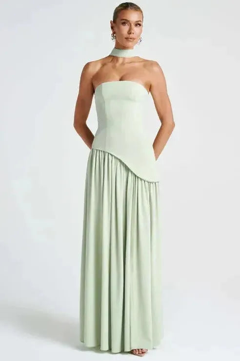 Sage green strapless maxi dress with high slit and asymmetrical neckline
