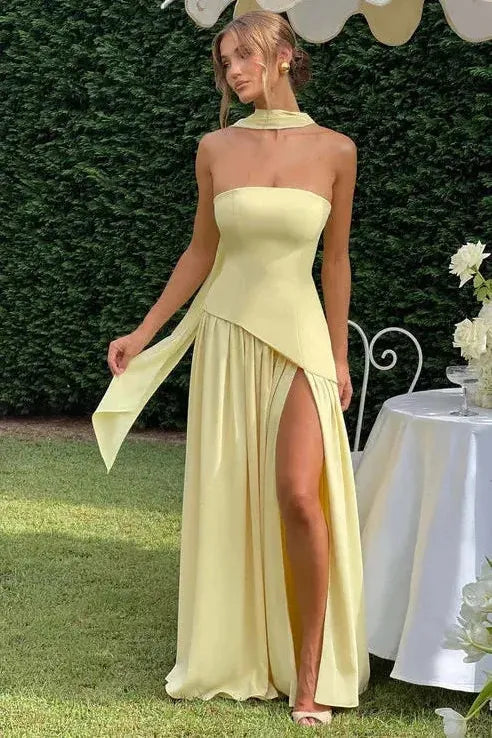 Yellow strapless maxi dress with choker neckline and high slit outdoor styling