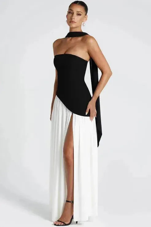 Black and white strapless maxi dress with high slit and draped neckline detail