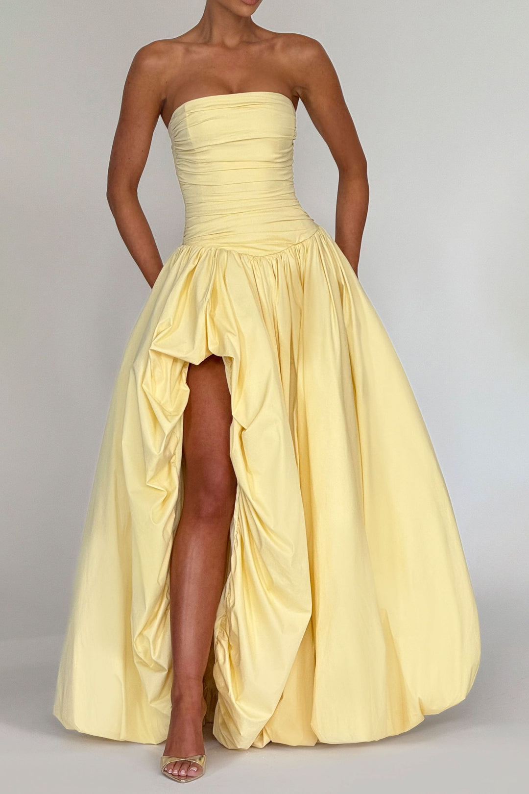 Yellow strapless maxi dress with gathered high-low hemline detail