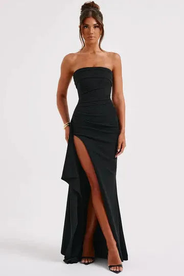 Front view black strapless maxi dress with asymmetrical split detail