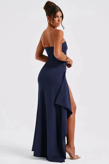 Back view navy strapless maxi dress showing split train detail