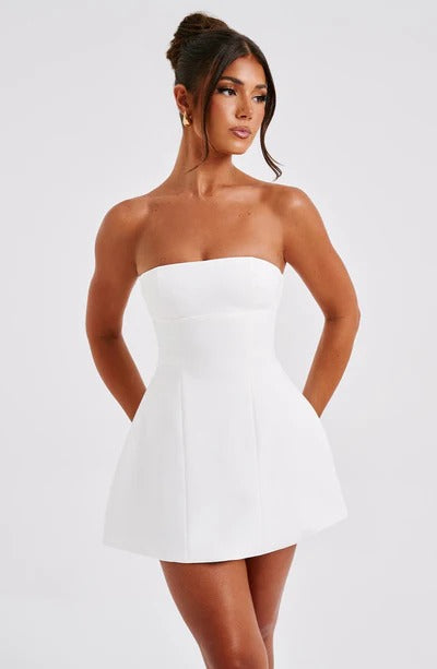 White strapless bubble mini dress with seamed bodice and flared skirt, front view