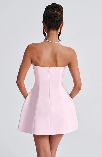 Blush pink strapless bubble mini dress with seamed bodice, back view