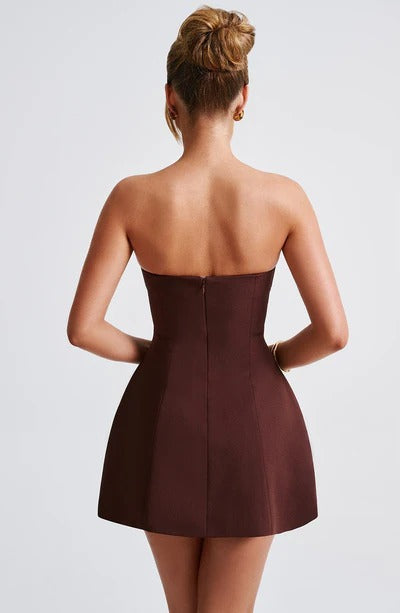 Back view of burgundy strapless bubble mini dress seamed bodice