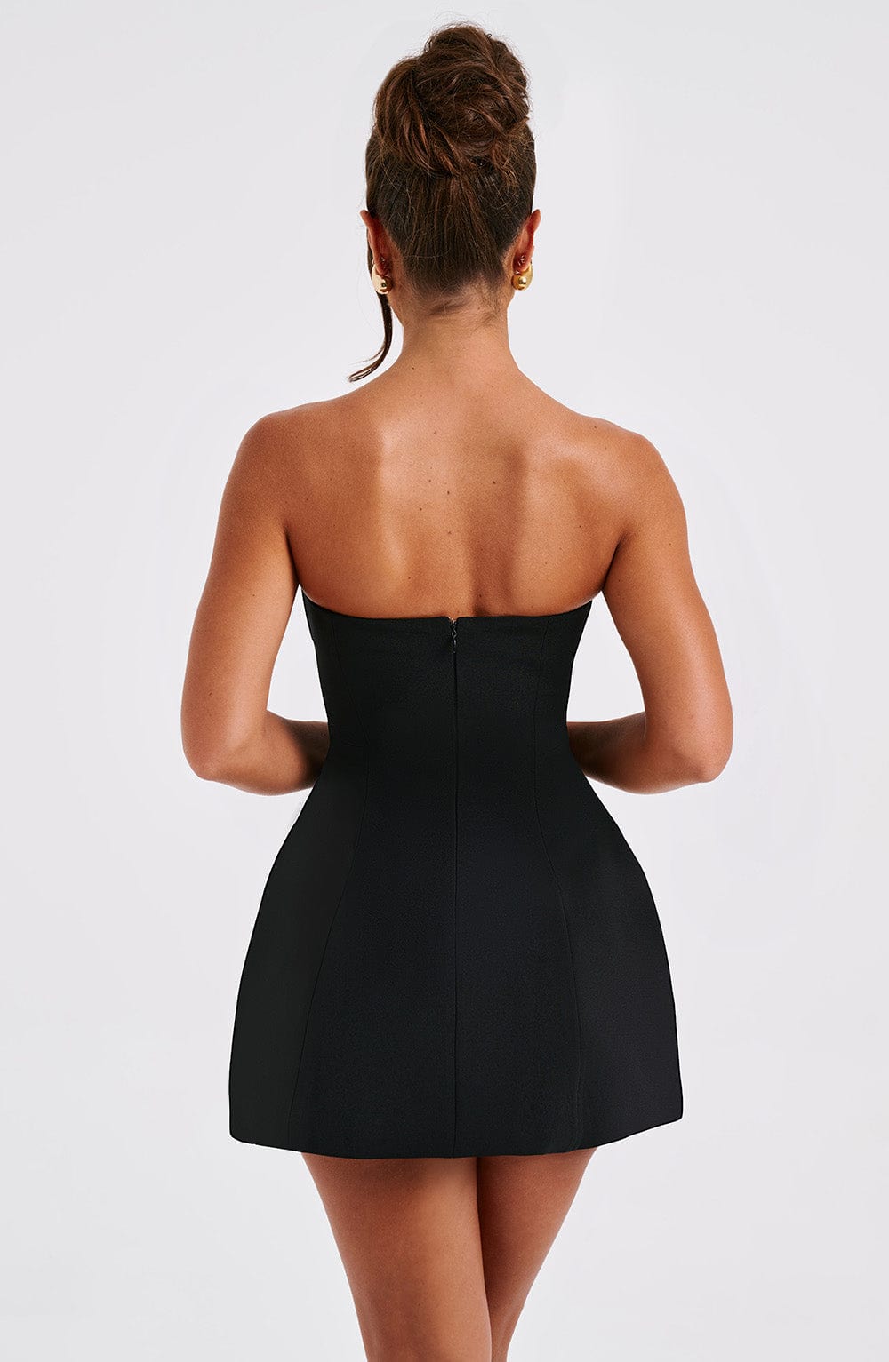 Black strapless bubble mini dress back view with center seam