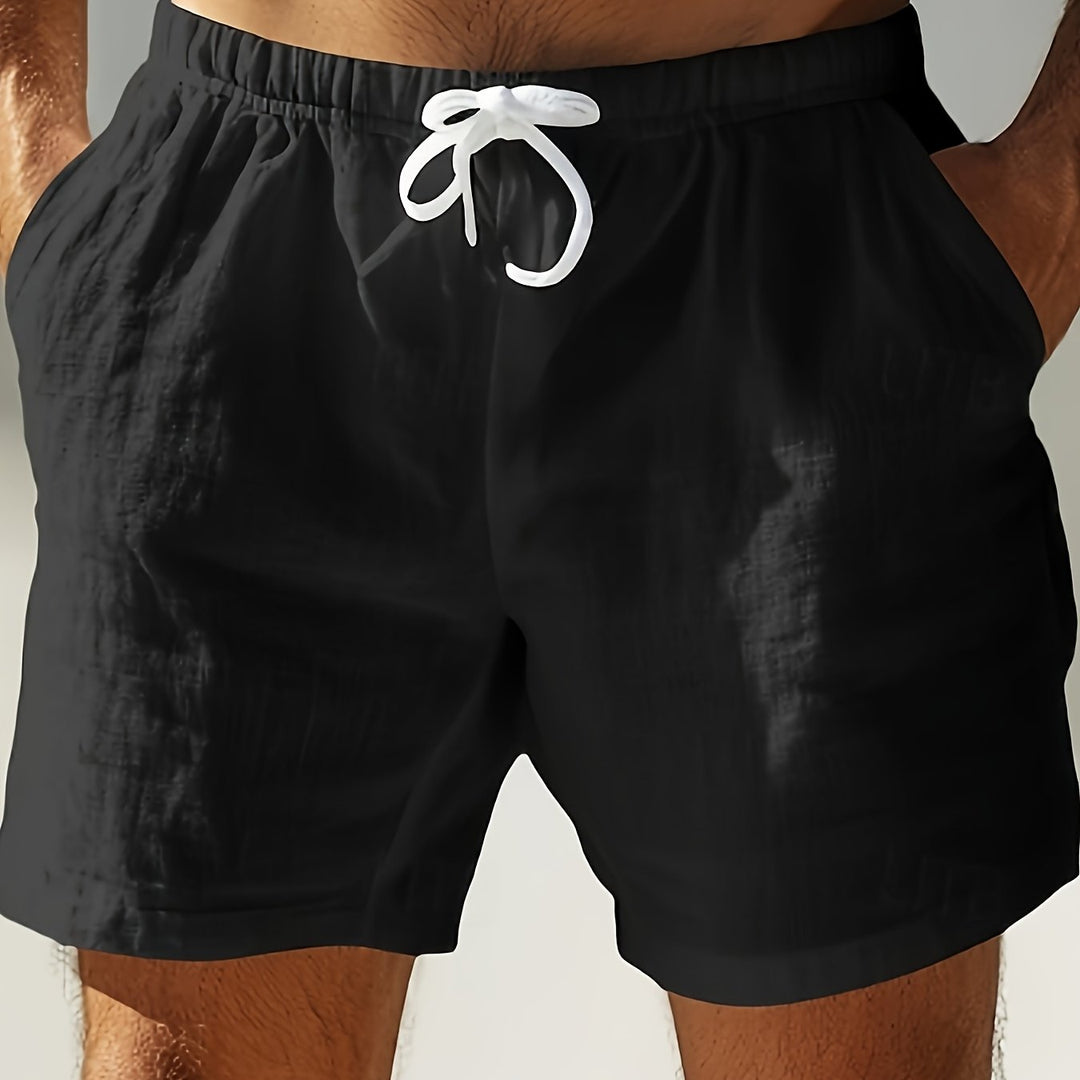 Front view of black men swim shorts with drawstring and relaxed fit