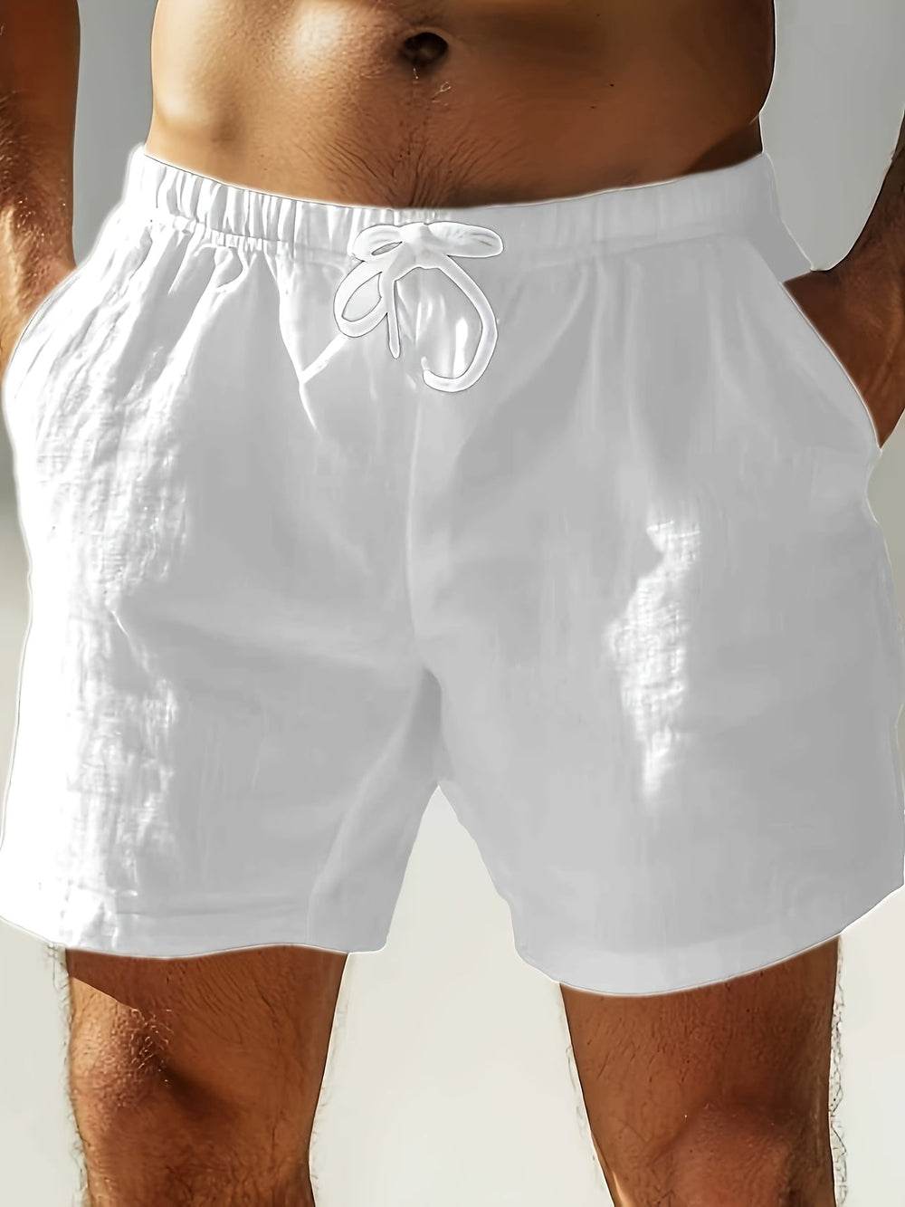 White swim shorts with drawstring on model, front view, lightweight men swim shorts