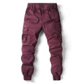 Maroon cargo jogger pants for men shown front view with zip pockets and cuffed ankles