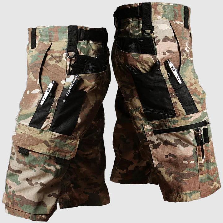 Tan camo men cargo knee length shorts featuring reinforced side cargo pockets, zipper accents, and belt loops