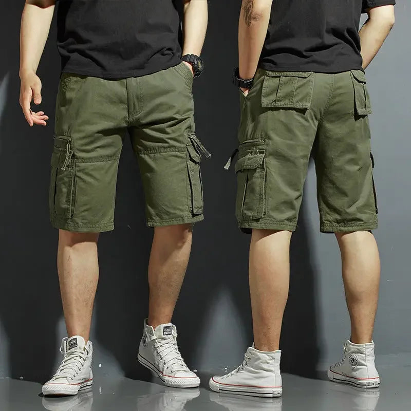Olive green cargo knee length shorts with multiple pockets, front and back view on model