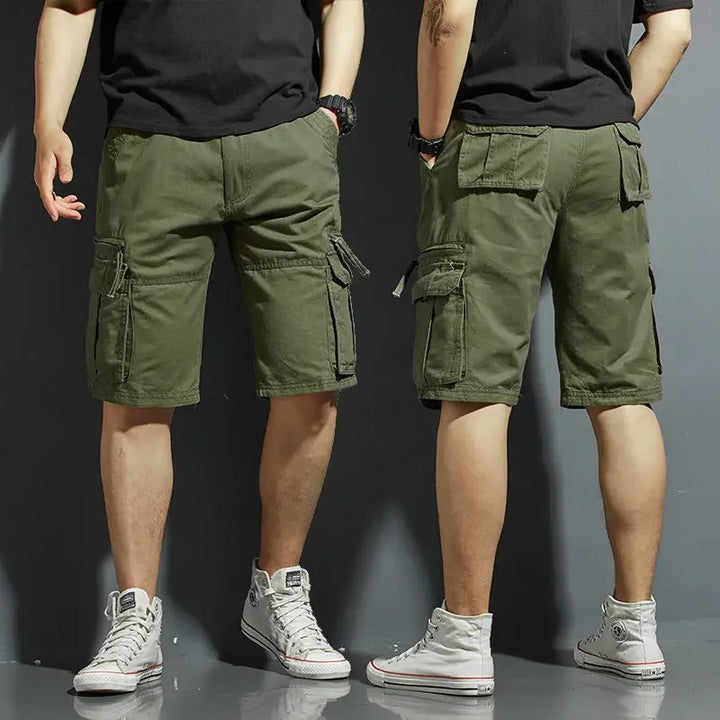 Olive green cargo knee length shorts with multiple pockets, front and back view on model
