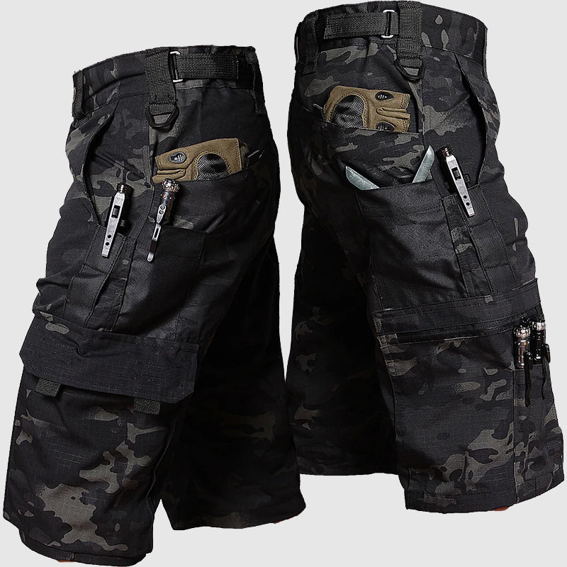 Black camo men cargo knee length shorts with large side pockets, zipper details, and belt loops