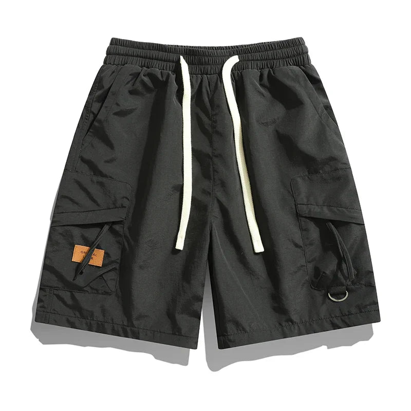 Black men's cargo shorts with elastic waistband, drawstring, and utility pockets