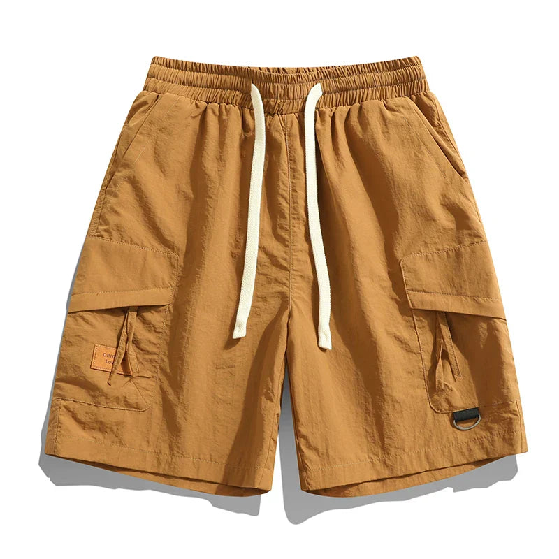 Brown men's cargo shorts with elastic waist, drawstring, and side flap pockets