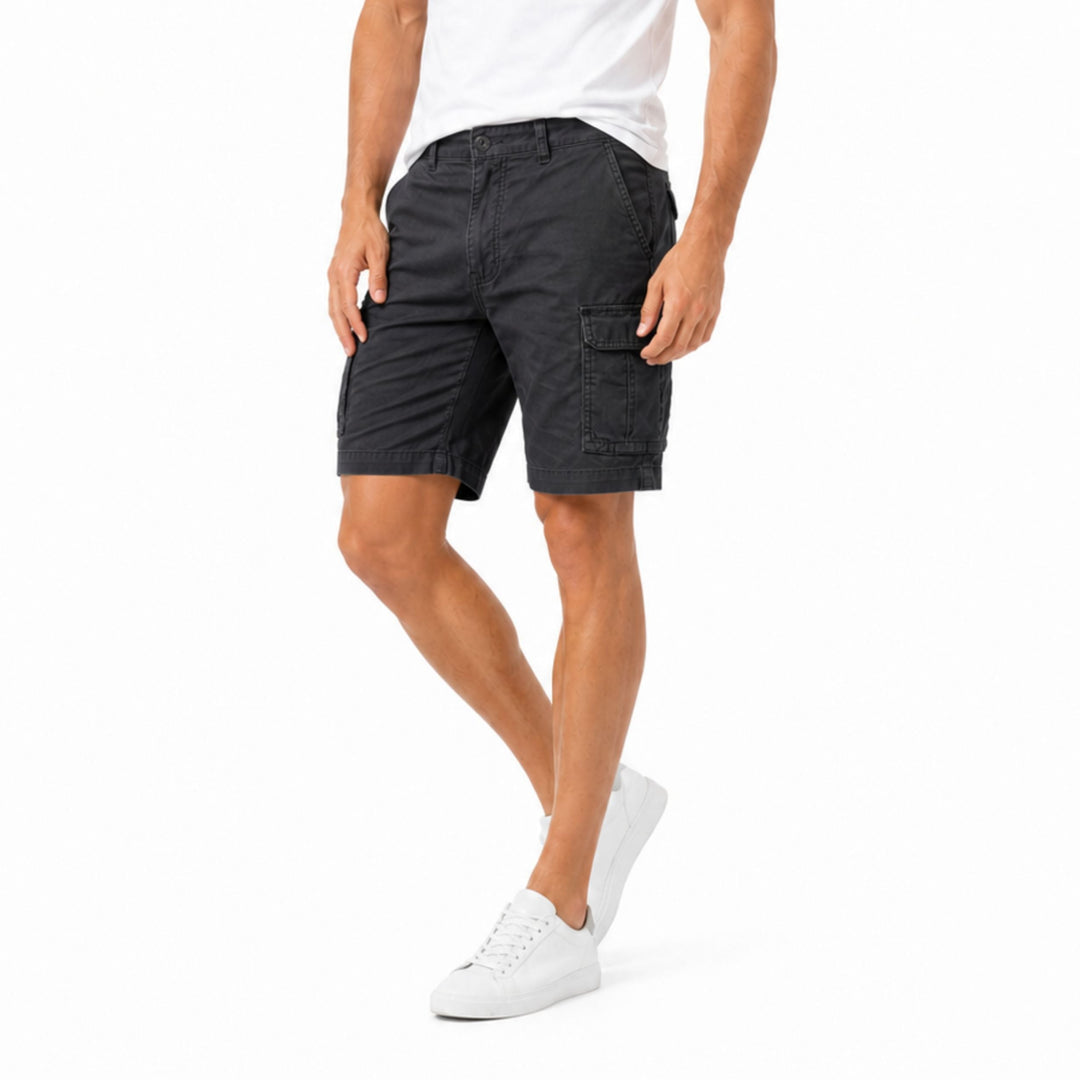 Front view of black men cargo shorts with flap pockets and straight fit
