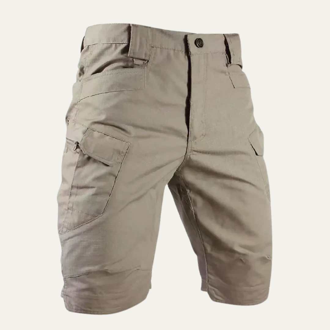 Light khaki cargo shorts with pockets and button waist, close-up front detail