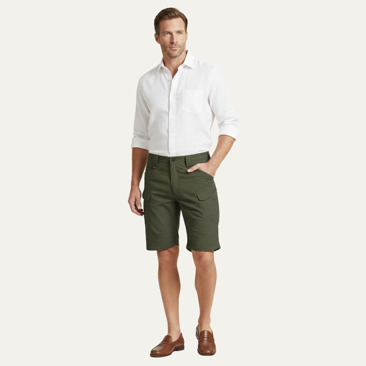 Olive green cargo shorts for men styled with a white shirt, full-body view