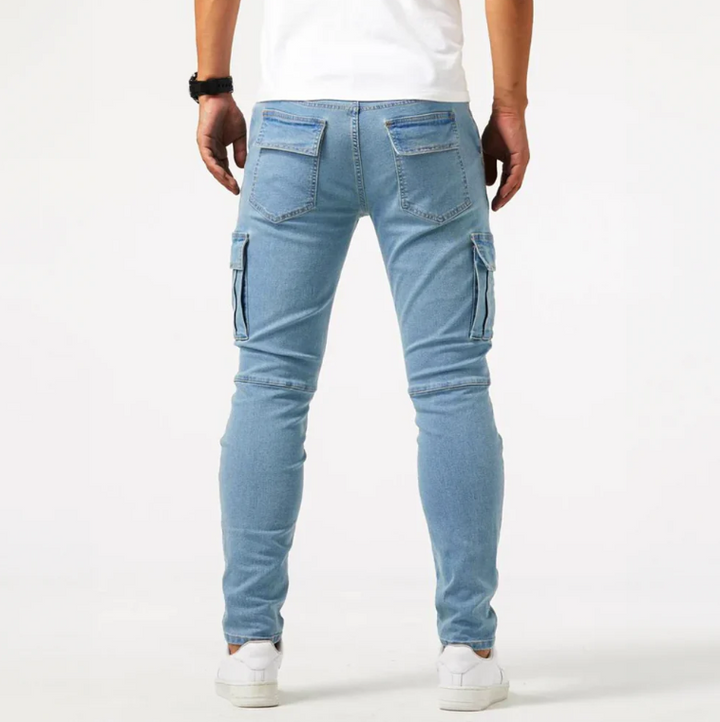 Back view of light blue cargo skinny jeans with side pockets and fit legs