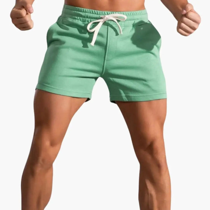 Green men casual shorts with drawstring waistband and above knee cut