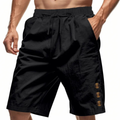 Black men casual shorts with drawstring waist and side button detail on model