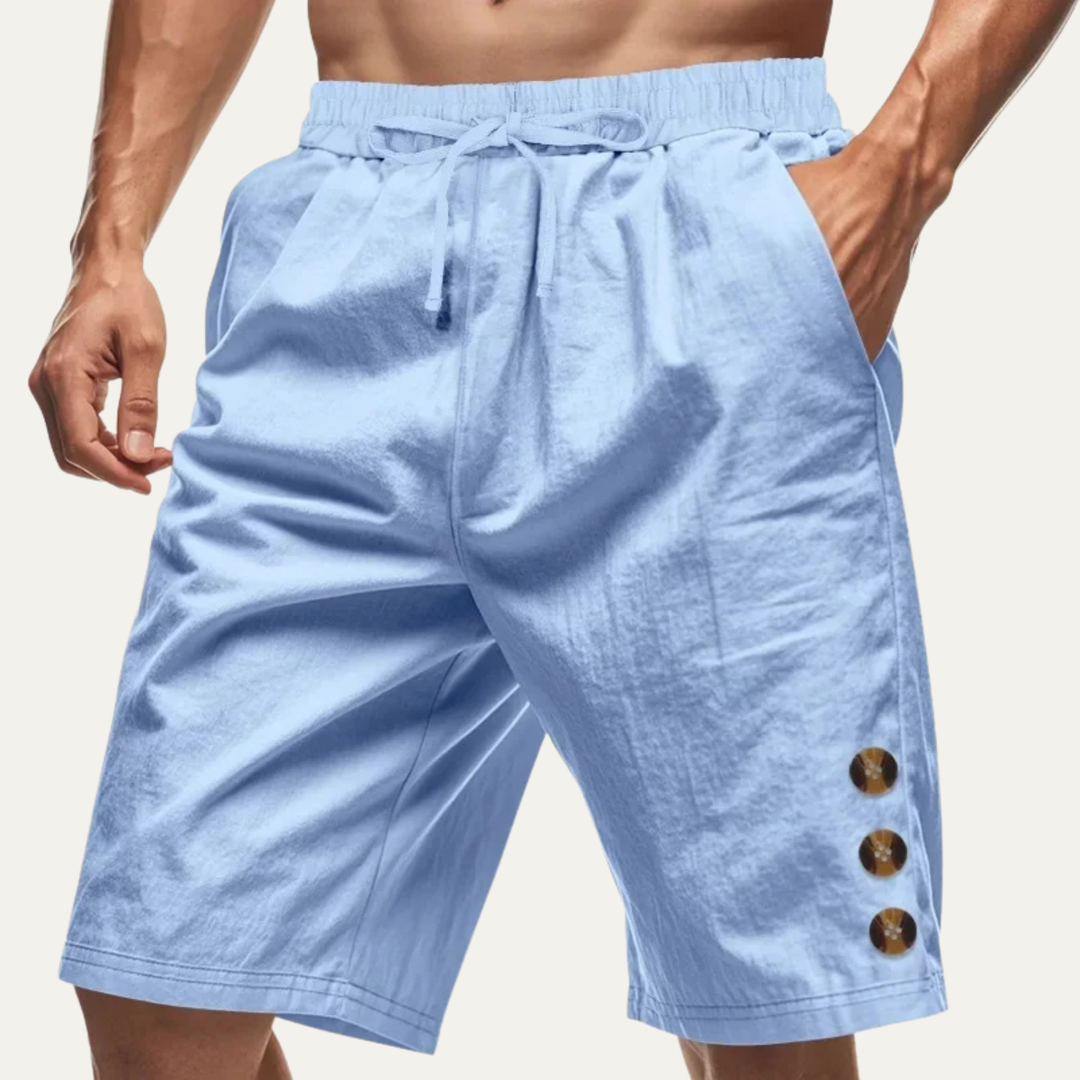 Light blue casual shorts with drawstring waist and three button detail on model