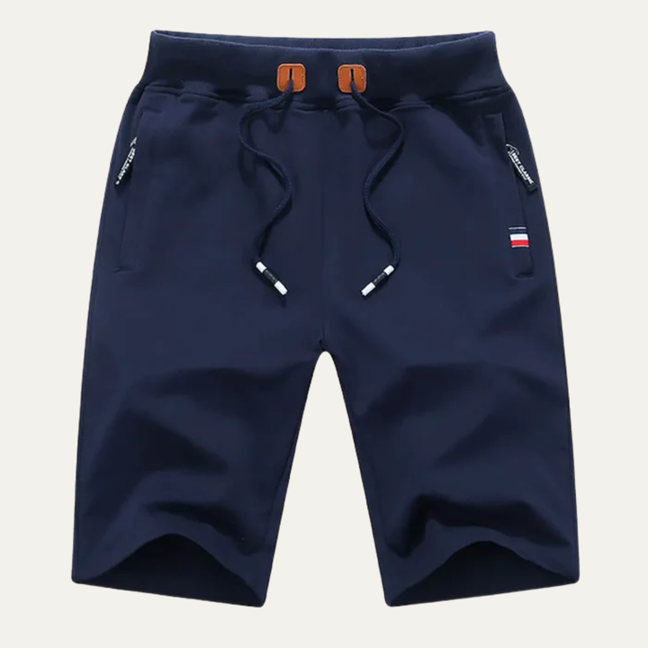 Navy blue men casual jogger shorts with drawstring, zip pockets, and straight hem