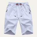 White men casual jogger shorts with drawstring, side pockets, and small logo details