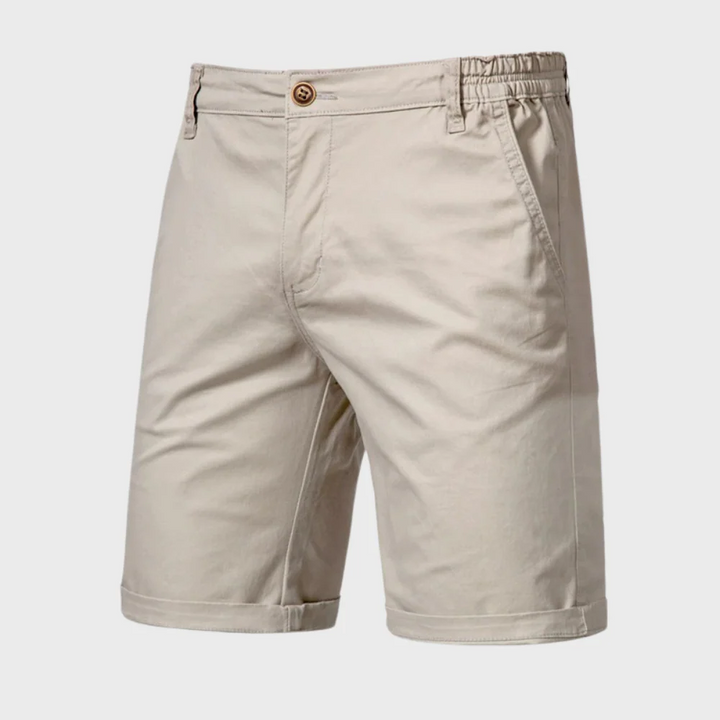 Beige men casual tailored shorts with pockets, elastic back waistband and cuffed hem front view