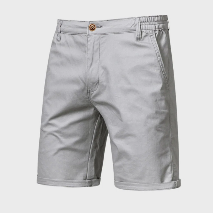 Light gray men casual tailored shorts with pockets, belt loops and rolled hem front view