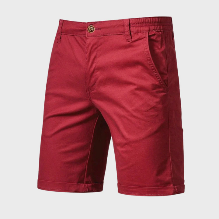 Red men casual tailored shorts with pockets, slant pockets and button closure front view