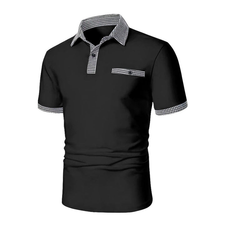 Black short sleeve polo shirt with checkered collar, placket, and cuff trim