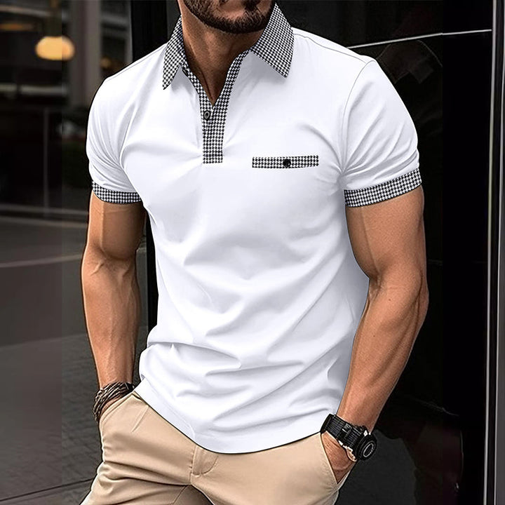 White short sleeve polo shirt with checkered collar and sleeve cuffs styled as casual menswear