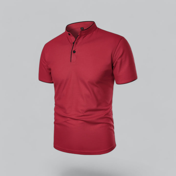 Angled front view of red collarless polo shirt with short sleeves and textured fabric