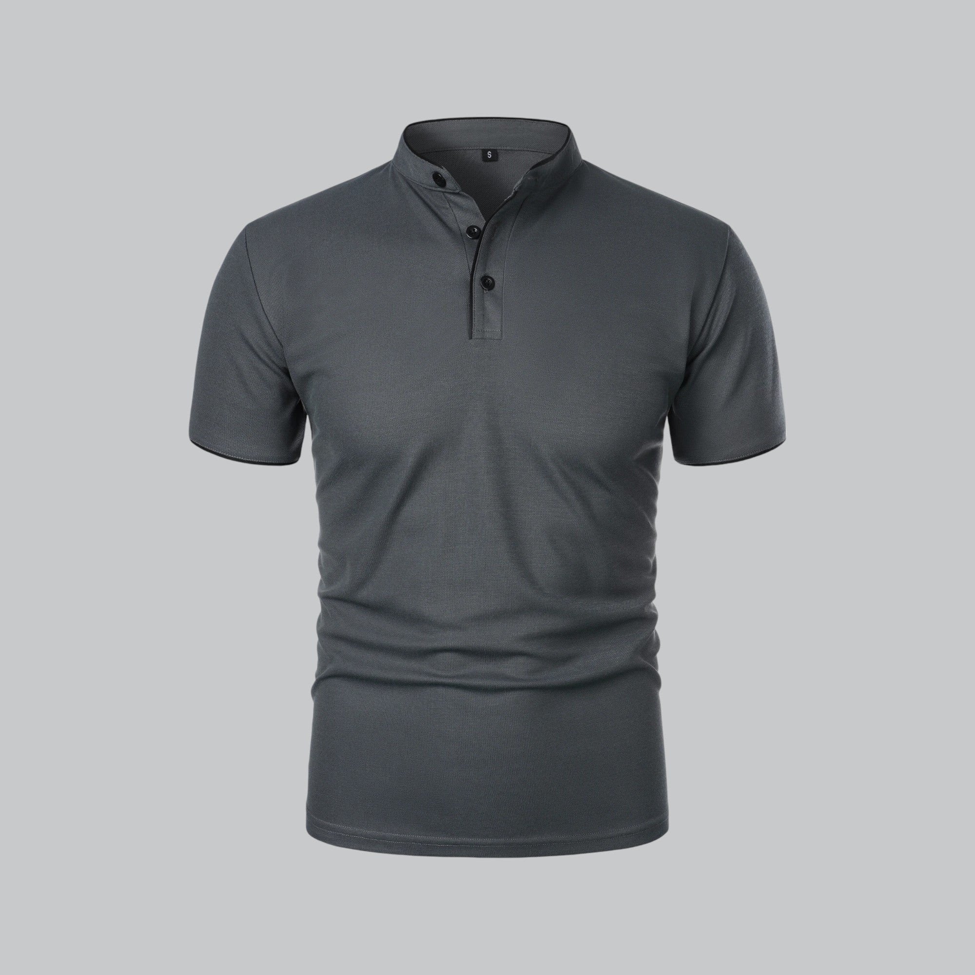 Three-quarter front view of light beige polo shirt with stand collar and black-trimmed neckline