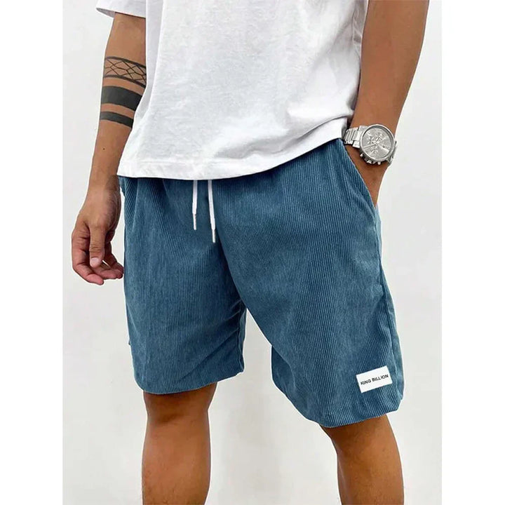 Blue mens corduroy drawstring shorts, knee length casual style with vertical wale texture