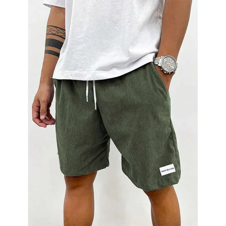 Olive green mens corduroy knee length casual shorts with drawstring waistband and pockets