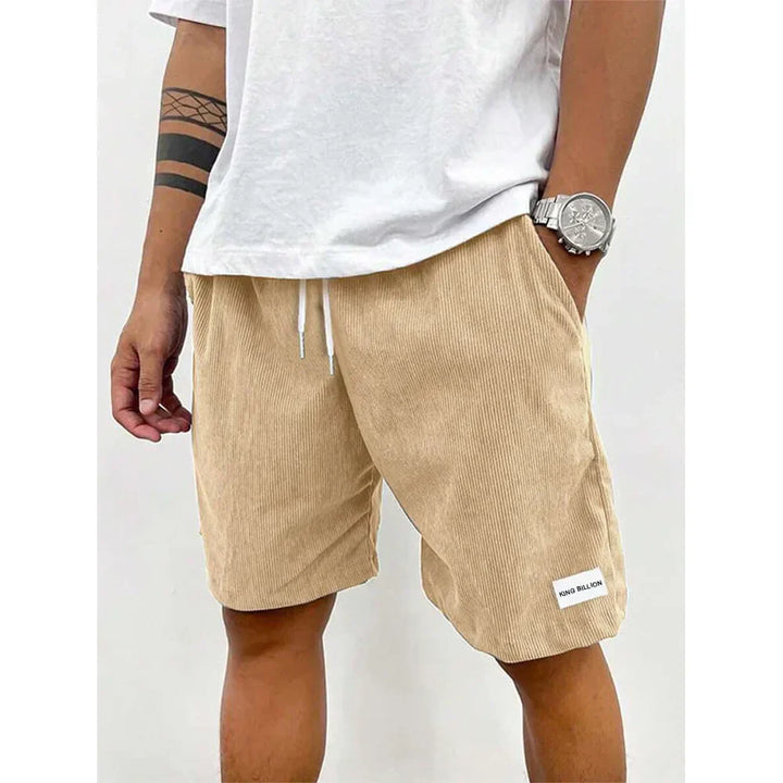 Beige mens corduroy drawstring knee length casual shorts with ribbed texture and side pockets