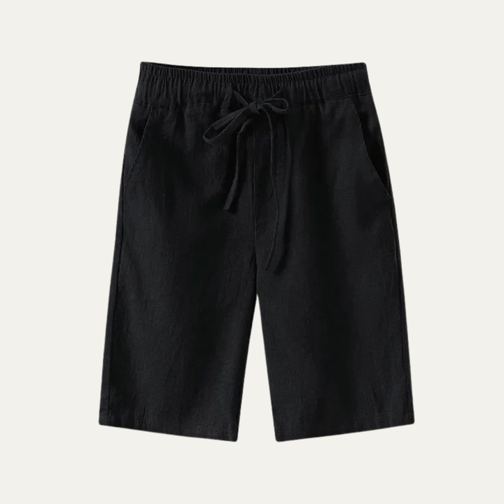 Black linen knee length shorts with drawstring waist and straight leg cut