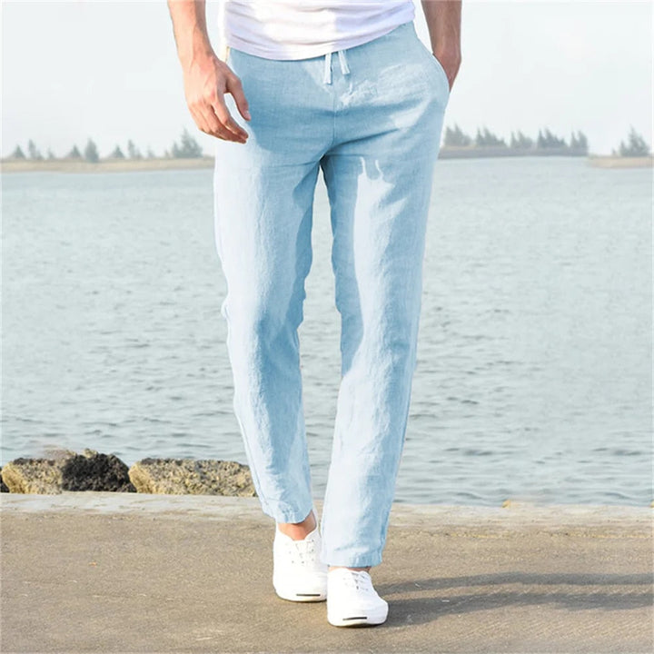 Light blue men's linen pants with relaxed straight leg fit and breathable summer slacks