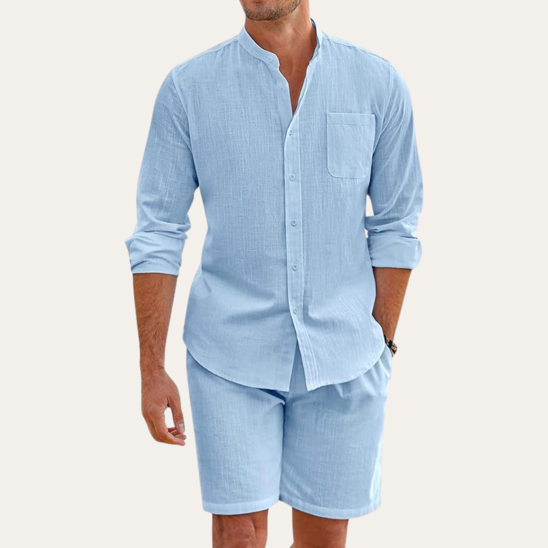 Light blue linen shirt shorts set featuring a long sleeve button-up shirt and matching shorts