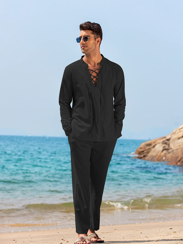 Black long sleeve V-neck matching set with lace-up shirt and straight leg pants on beach