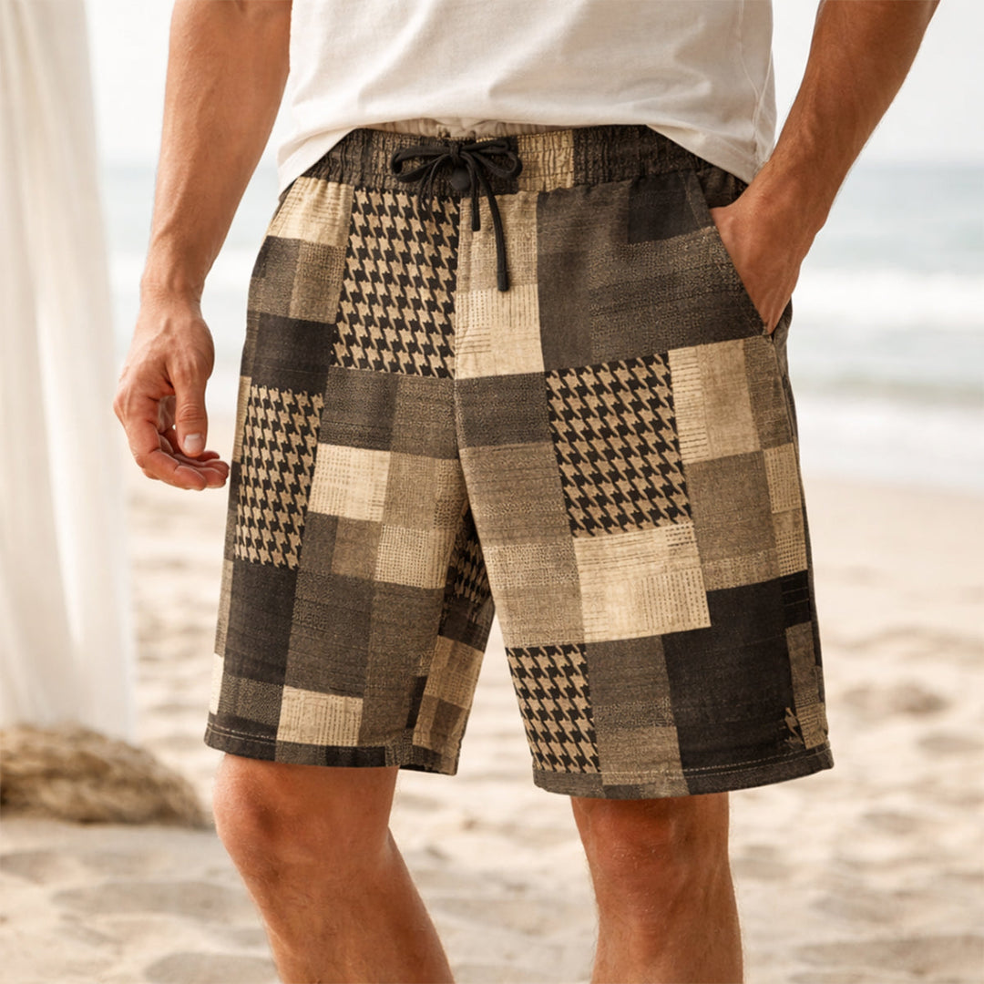Front view of brown patchwork shorts with elastic waist and black drawstring